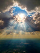 © Gary - Dramatic sun ray symbolizing heavenly light symbolize divine presence, truth, spiritual illumination,