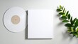 © Nashihal - A vinyl record mock up, plain, blank, white sleeve on a white backdrop