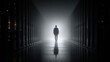© weerasak - A solitary figure walks down a dimly lit corridor flanked by rows of storage units or servers, casting a long shadow in the misty, futuristic environment.
