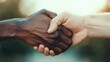© svastix - The image captures the powerful moment of two hands shaking, symbolizing unity, friendship, and cooperation across different backgrounds and cultures, evoking trust and collaboration.
