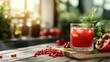 © svastix - This image features a refreshing glass of pomegranate drink, garnished with mint leaves and surrounded by vibrant pomegranate arils, capturing the essence of healthy living.