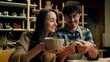 © Yuliia - Caucasian woman man teacher student in pottery workshop handmade craft hobby potter teaching sculpture ceramics clay modeling couple date girl guy have fun laughing creating crockery in art studio