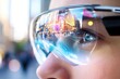 © dashtik - Man wearing augmented reality glasses with futuristic urban reflection
