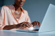 © Papukos - Businesswoman working late at night on laptop computer