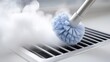 © Katsiaryna - Cleaning a ventilation grill with steam and a brush to remove dust and dirt