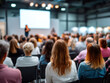 © perfectlab - Wide overhead shot of large audience attending keynote session