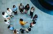 © Jacob Lund - Arial view of new hire orientation in a modern lobby