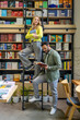 © zinkevych - Multicultural man and woman working in library
