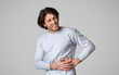 © Prostock-studio - Liver pain. Guy holds hands on his side with torment facial expression