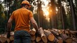 © svastix - A dedicated man wearing protective gear works diligently in a sunlit forest, showcasing the themes of hard work, diligence, and respect for nature's resources.