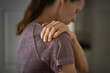 © kieferpix - Female with pain in her shoulder.
