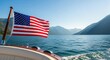 © Saiyam - An American flag waves majestically from the stern of a boat cruising across a pristine lake surrounded by majestic mountains on a clear sunny day