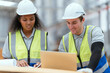 © 2B - Professional worker team in safety uniform, supervisor inspector in packaging stock order at cardboard factory warehouse, piles of stacking paper manufacture, recycling industrial production