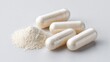 © Gibster - Magnesium supplement. Capsules and powder, representing dietary supplements or pharmaceutical products.