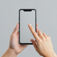 Person using smartphone with blank screen on gray background for mockup display or app presentation