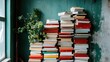 © svastix - An artistic representation of stacks of colorful books placed against a distressed green wall, showcasing a vibrant mix of titles and plant life that adds to the aesthetic ambiance.