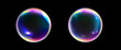 © Liza - Colorful soap bubbles on a transparent background. Bright, dreamy bubbles with a rainbow gradient effect and glares isolated on black background. Glossy water drop. Vector
