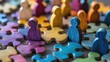 © ShutterMe - Colorful wooden figures represent diverse people connecting on jigsaw pieces. Teamwork, diversity concept visualizes HR strategies for inclusive workplace cultures. Different colored figures connect