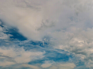 Wall Mural - Dramatic blue cloudy sky. Nature background for design. Rainy weather.