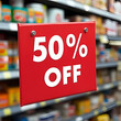 © Arief - Big 50% Discount Sign in Grocery Aisle