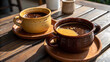 © Attaul - Two cups of coffee on a wooden table perfect for a coffee break or morning coffee routine outdoors