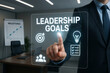 © foto Art - Leadership goals dashboard with businessperson interacting with digital interface in modern office, concept of executive planning, vision, team management, and performance objectives