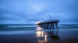 © Viandante VIsivo - Long wooden pier with glowing streetlights stretching into the ocean at dusk, calm waves and reflections creating a serene, moody coastal scene