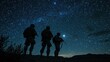 © elenaed - Army soldiers performing night vision training exercises under a starry sky