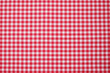 © methaphum - Closeup of a red and white checkered napkin or tablecloth texture. picnic cloth crumpled. Food decor element. Kitchen accessories. Top view background.