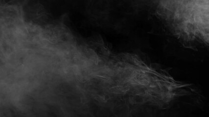 Wall Mural - a heavy, dense cloud of white smoke or fog rolls in from the left and churns, filling the frame with