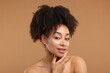 © New Africa - Portrait of beautiful Brazilian woman after spa treatment on light brown background
