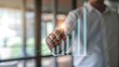 © Jo - Blurred Businessman Hand on Metaverse Financial Success Chart Glow