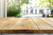 © EvgeniiasArt - Wooden table surface with blurred outdoor urban background scene