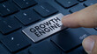 © SM - Finger pressing a silver keyboard key labeled growth engine symbolizing business development and progress