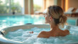 © Pete - Young woman enjoys spa jacuzzi. Relaxing in hot tub. Female rests at wellness center, enjoying hydrotherapy with bubbles. Vacation, leisure at luxury resort, healthy lifestyle.