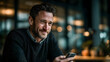 © Image Agency - Adult male checking mobile phone for email notification    -