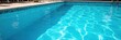 © Kreeta - Sparkling blue swimming pool on a sunny summer day, perfect for a refreshing dip Clean water, inviting and serene Ideal for relaxation and summer fun , vacation, calm