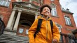 © rudi - Cheerful Student Walking Towards School Entrance