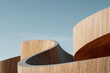 © Nino - closeup of modern wooden building facades emphasizing organic shapes and textures