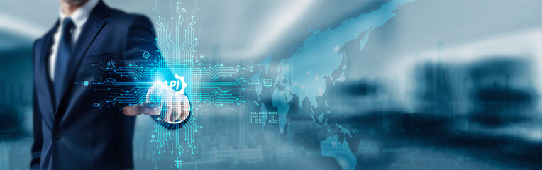 Businessman touching icon and word API on digital interface screen to access application programming interface for seamless data integration and enhanced software connectivity.