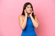 © luismolinero - Young Brazilian woman isolated on pink background frustrated and covering ears