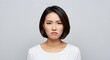 © helga - Young Asian Woman with Displeased Expression