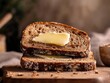 © Elegance Frames - A toasted whole wheat bread slice with butter melting into the surface