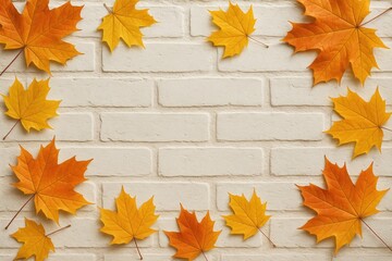 Wall Mural - Falling autumn leaves against a white brick background
