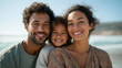 © Катерина Євтехова - Mixed Race Family Enjoying Summer Beach Day Together