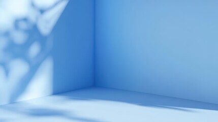Wall Mural - a minimalistic corner of a room painted in soft blue with sunlight casting abstract shadows on the w