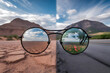 © Art of Life - A pair of eyeglasses reflecting two different worlds � one side a desert, the other a blooming forest � with no face behind them, surreal contrast of perception
