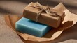 © Irina - Light blue soap bar in kraft paper packaging