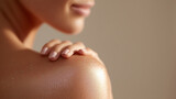 Glowing skin with delicate shimmer, hand gently touching shoulder. Soft light, perfect for beauty, skincare, wellness, and spa concepts. Ideal for cosmetics and body care advertising.