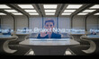 © Latif - Futuristic conference room scene with a woman interacting with holographic displays.